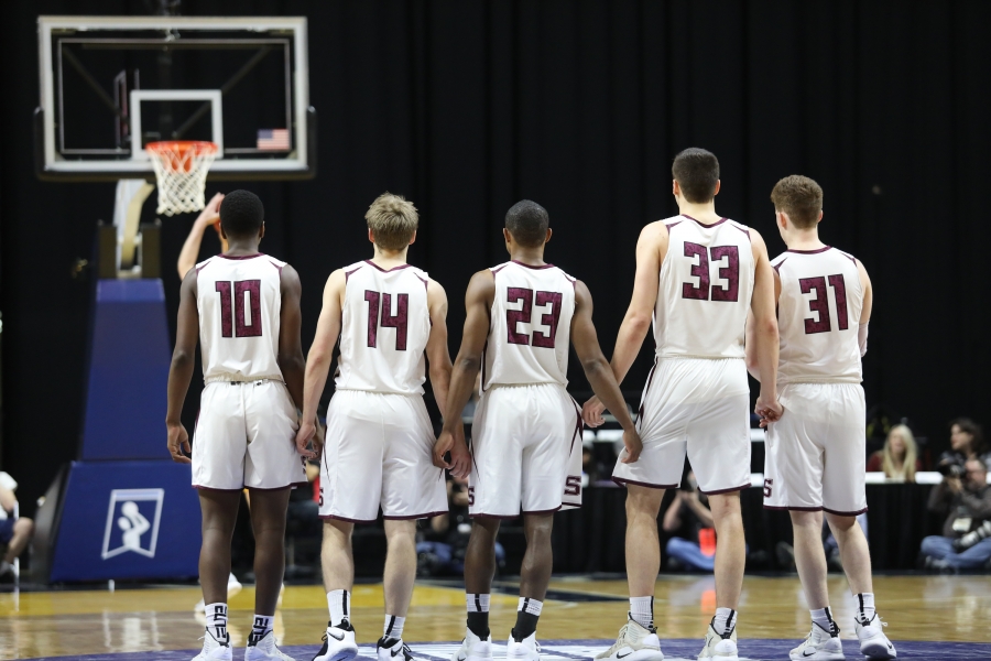 Basketball players lined up